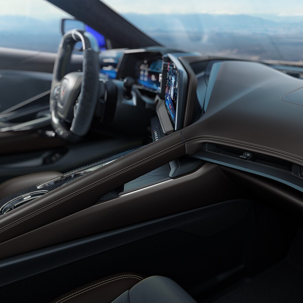 2026 Chevy Corvette Z06 Interior in Very Dark Atmosphere with Natural Tan Accents