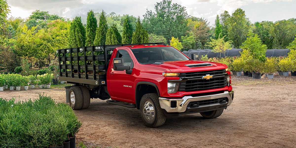 2026 Chevy Silverado 3500 HD Chassis Cab Hauling Trees From a Gardening Center