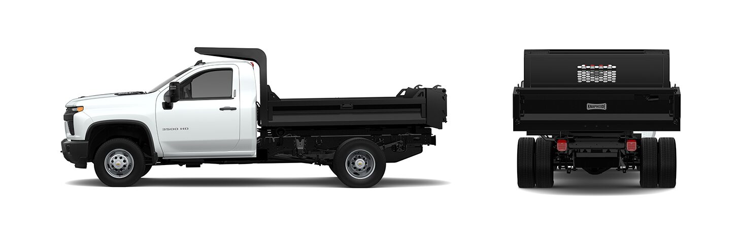 A White Chevrolet Silverado 3500 Chassis Cab Truck, Configured With a Black Flatbed and Head Rack, Viewed From the Side and Rear Angles.