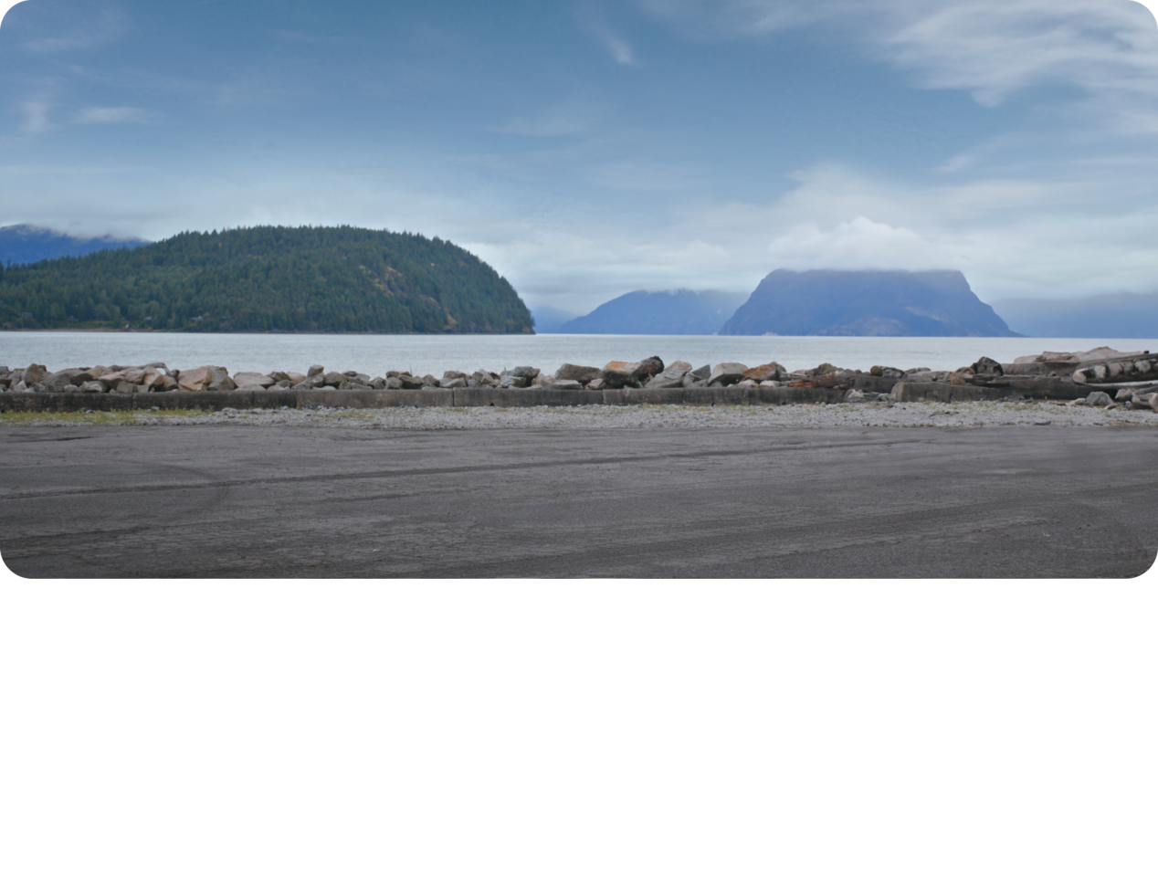 Scenic View of a Lake and Rolling Mountains