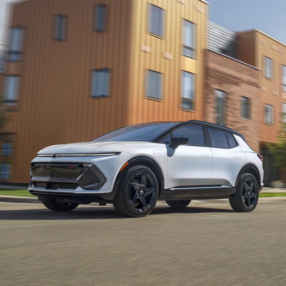2026 Chevy Equinox EV Driving Through an Intersection