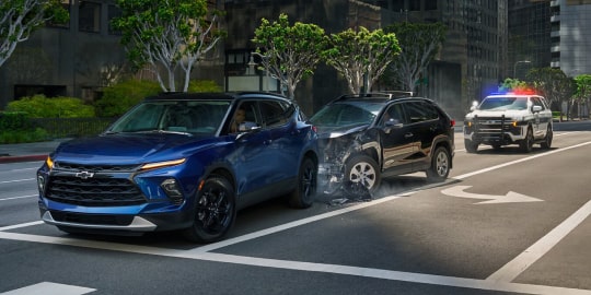 Chevy Vehicle In a Car Accident with a Police Vehicle Coming to Assist