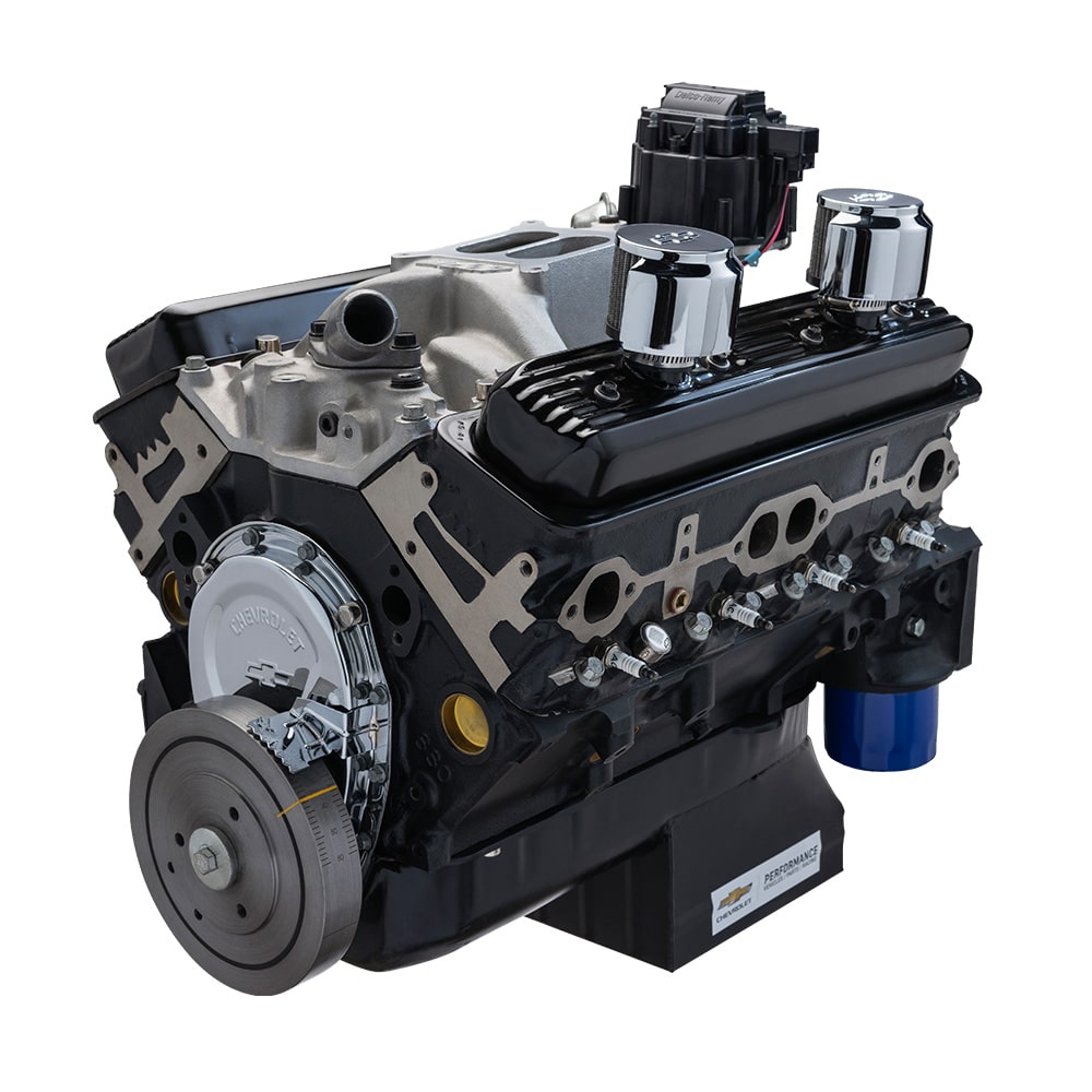 Classic pickup truck parked near garages