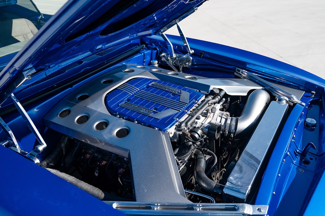 A Side View of the LT4 Engine Inside a Blue 1967 Chevrolet Camaro SS.