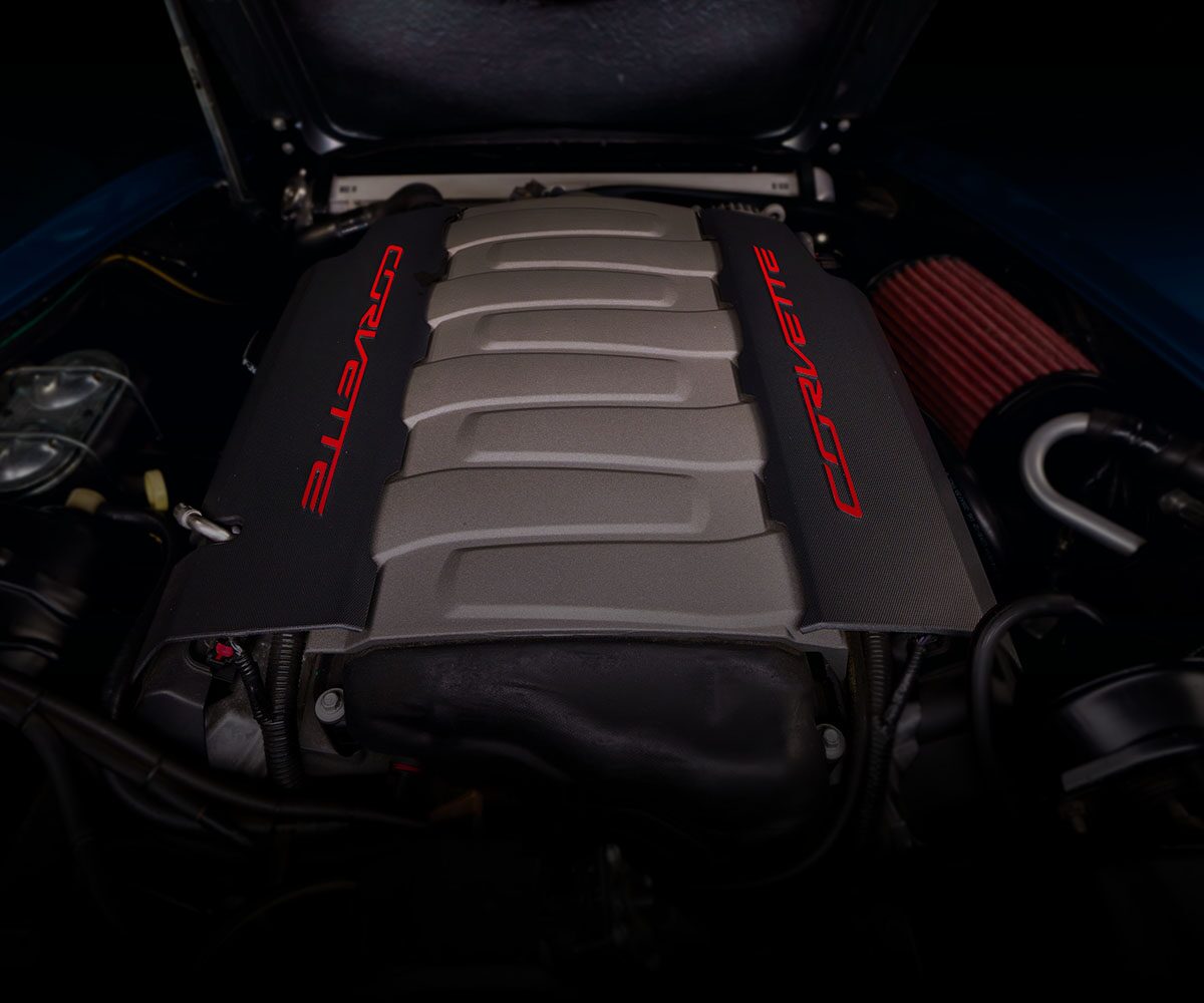 Front View of a Corvette Engine with the Hood Placed over It