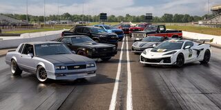 Two Rows of Chevy Vehicles on a Racing Track