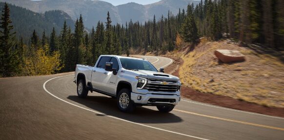 A Chevy Truck Drives Through the Mountains