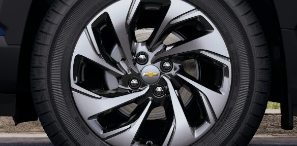 A Tire Rim with a Chevy Logo in the Center