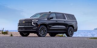 Front Three-quarters View of the 2026 Chevy Suburban Parked Near the Lake