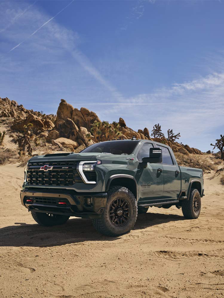 A 2026 Chevy Silverado HD Driving Off-Road in the Desert