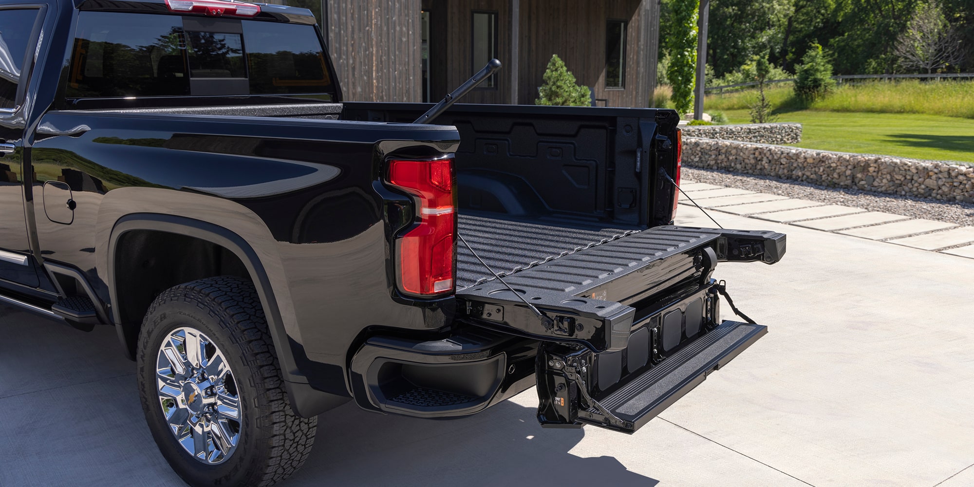 Three-Quarters Rear View of a 2026 Silverado HD Parked in a Driveway