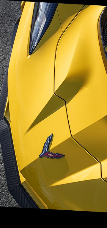 Birds Eye View of a Yellow Chevy Corvette ZR1 Going down the Road