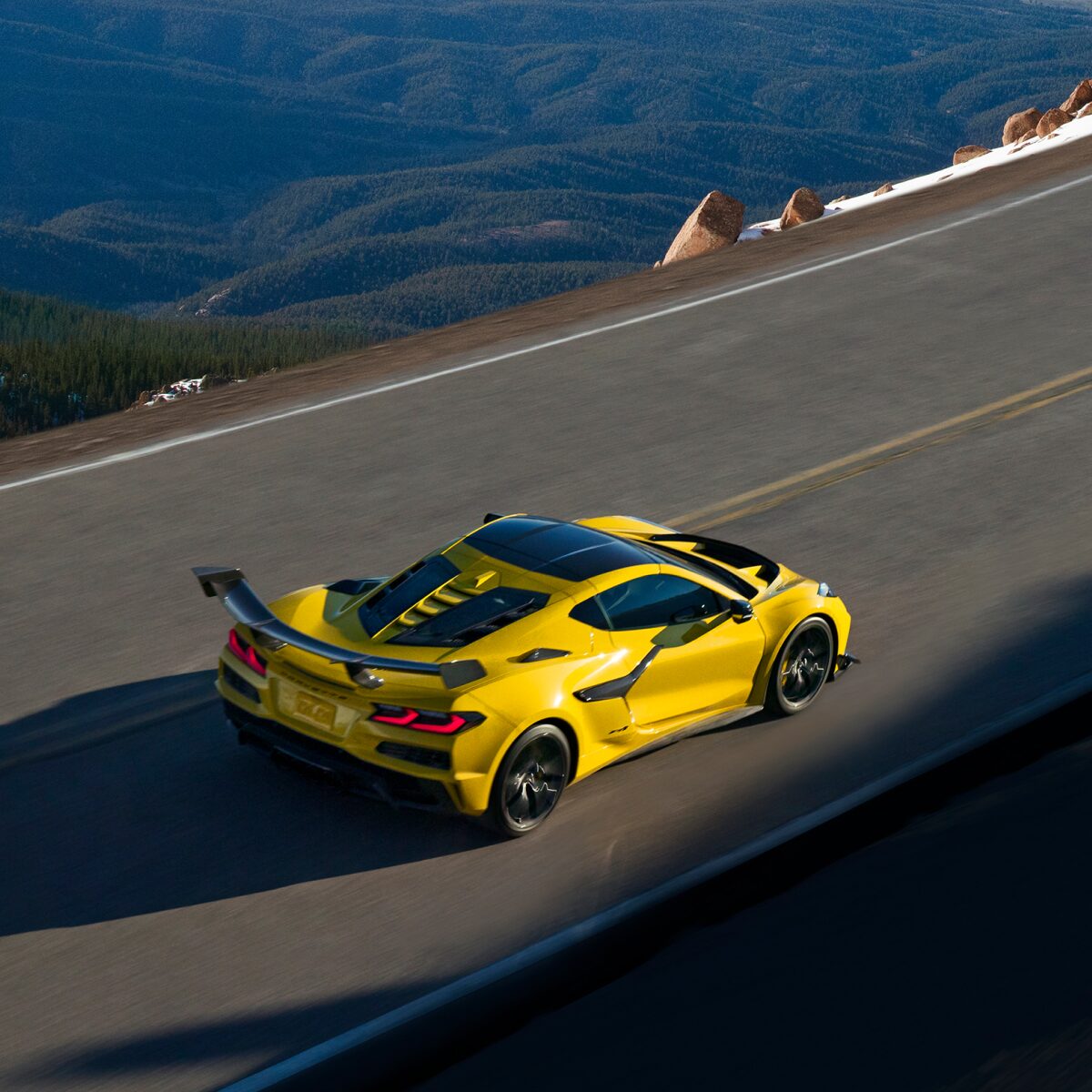 Birds Eye View of a Yellow Chevy Corvette ZR1 Going down the Road