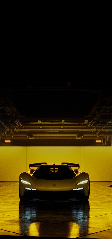 Front View of the 2026 Corvette CX.R Illuminated in a Dark Parking Garage