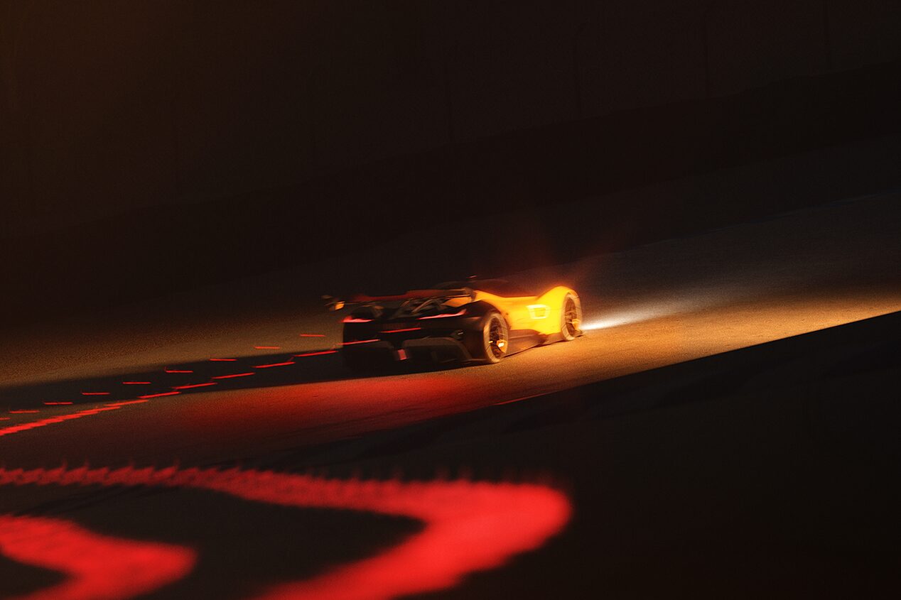 Back View of the 2026 Corvette CX.R Racing Down a Track at Night