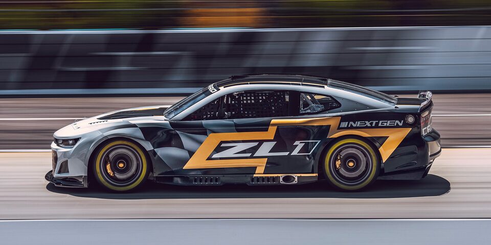 2021 Next Gen Nascar Motorsports: Profile Shot of Racecar Racing on Racetrack