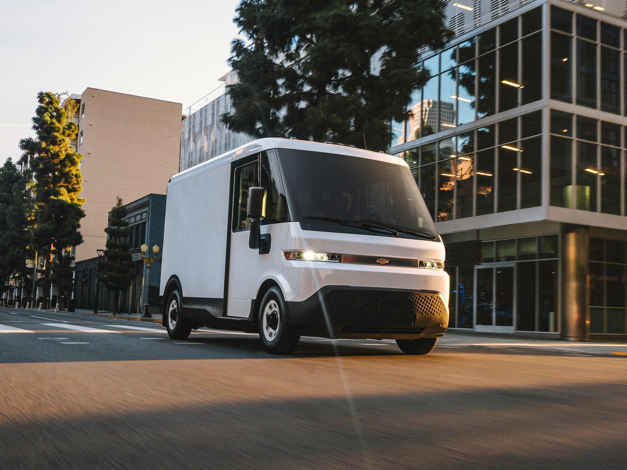 2025 Chevy Brightdrop Van Driving On City Street