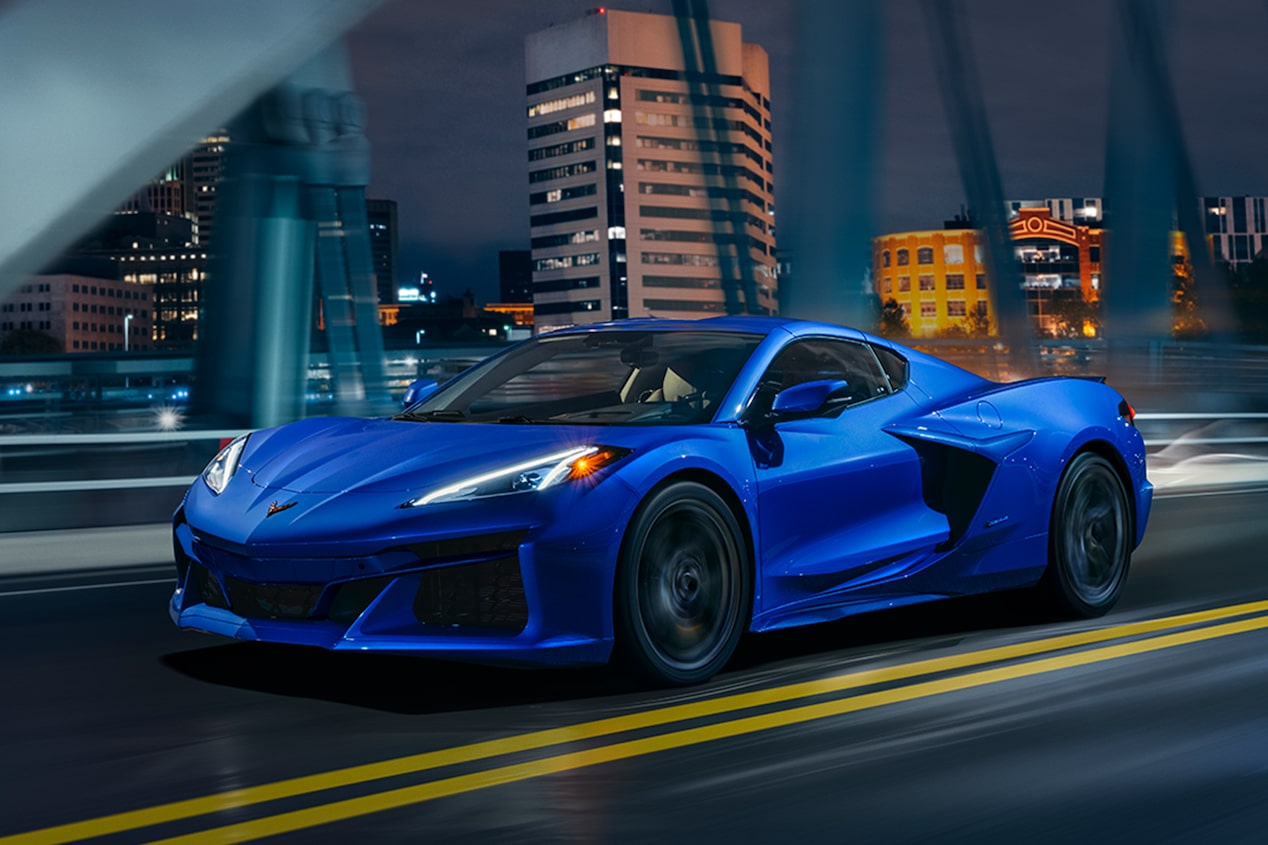 The Blue Corvette E-Ray Driving on a City Street