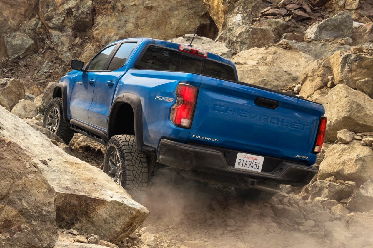 Blue Colorado ZR2 Driving on Rocky Off-Road Terrain