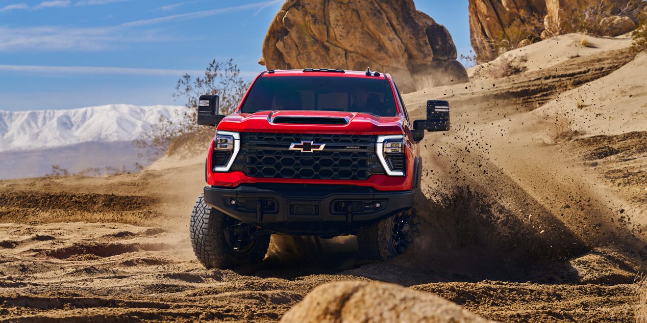 Red ZR2 Truck Offroading in Desert