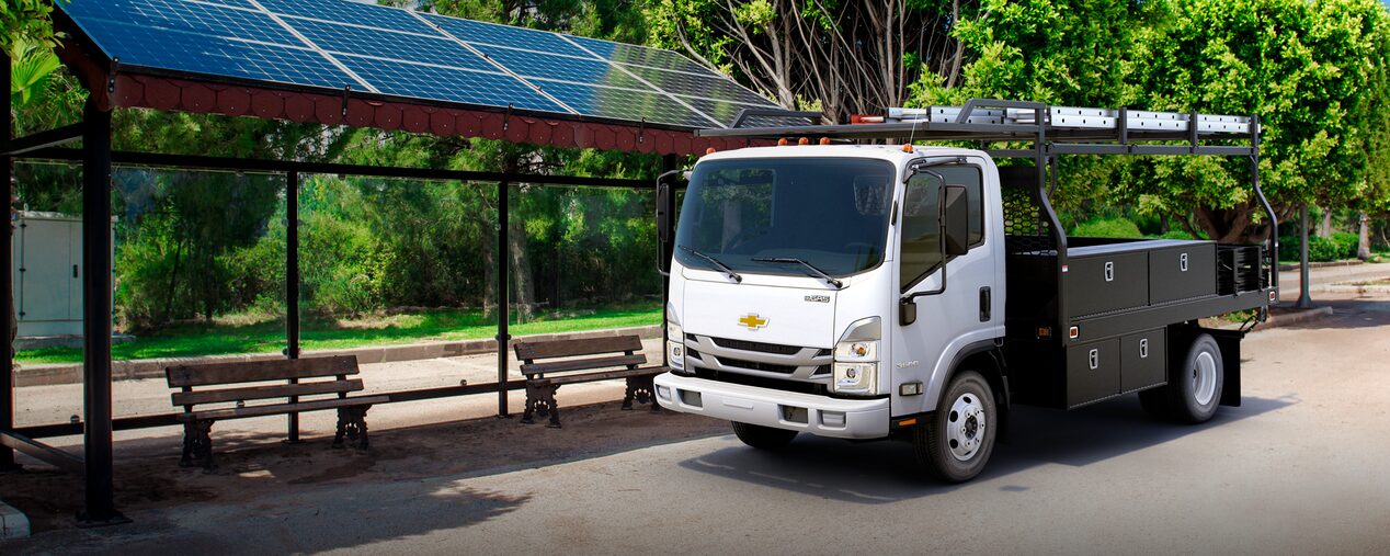 2025 Chevy Low Cab Forward Parked Near a Bus Stop with Solar Panel Roofing