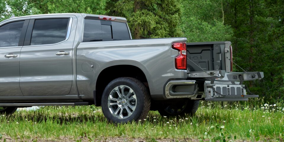 2025 Chevrolet Silverado Parked in the Grass With the Tailgate Lowered