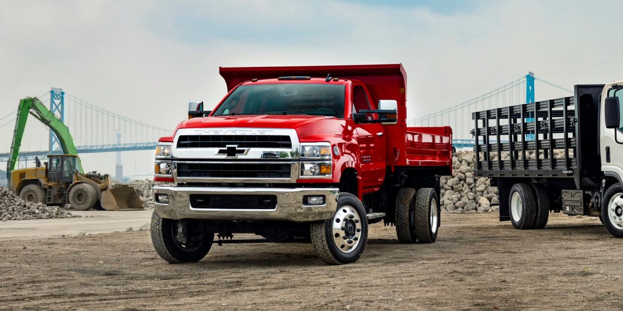 2025 Chevy Silverado Medium Duty Chassis Cab Parked on a Jobsite Near Construction Equipment