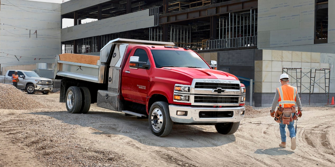 2025 Chevy Silverado Medium Duty Chassis Cab Pulling Out of a Construction Site
