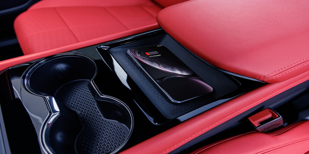 Close-up of the Cup Holder of a Red Interior 2025 Chevy Blazer EV