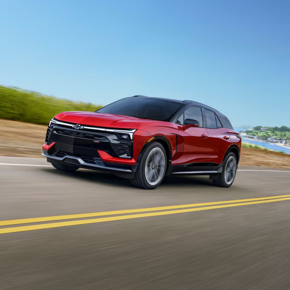 Red 2025 Chevy Blazer EV Driving on Road