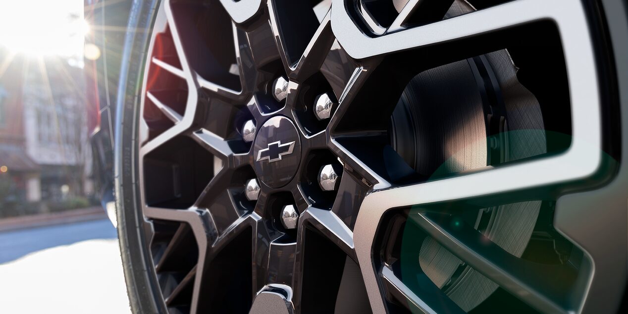 Close-up of a 2025 Red Chevy Blazer Wheel Rims