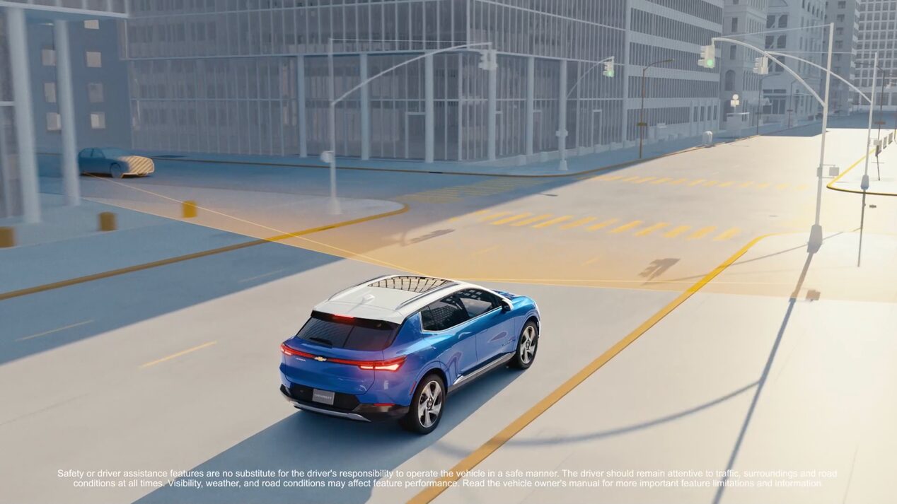 Rear Three Quarters View of a 3D Image of 2025 Chevy Equinox EV Driving Down the Road