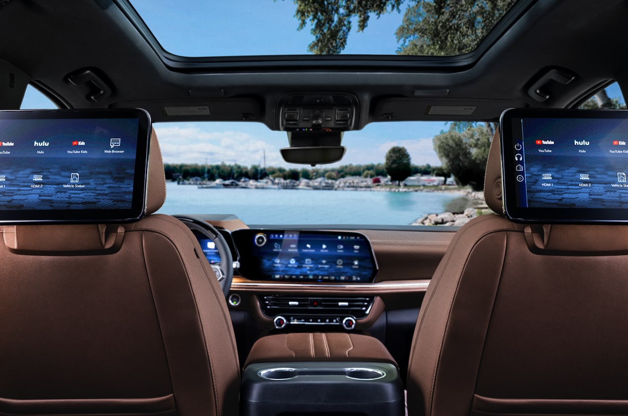 View of Rear Seating with Tablets on the Back of the Headrests in the 2025 Chevrolet Suburban SUV