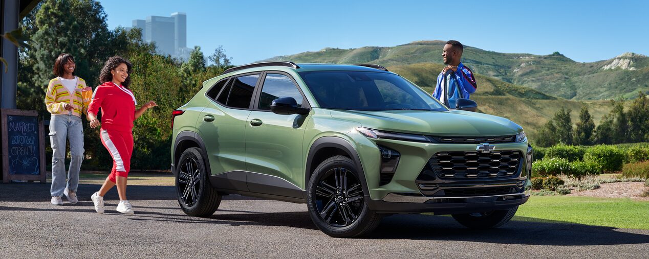 Group of Friends Approaching a 2025 Chevy Trax
