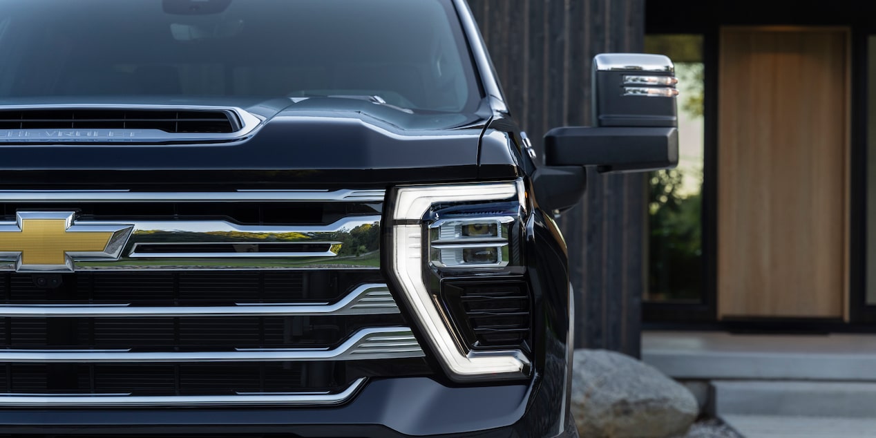 Front View of a Black  2025 Chevy Silverado HD Headlight