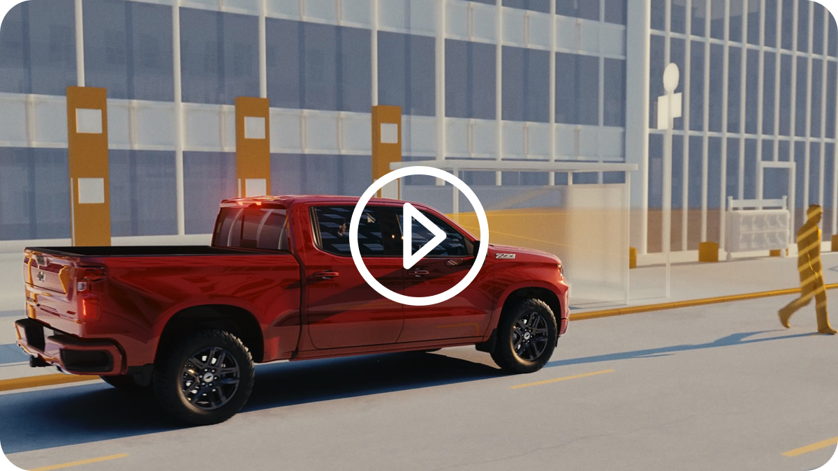 A Rear View of a Red 2025 Chevy Silverado in a Video