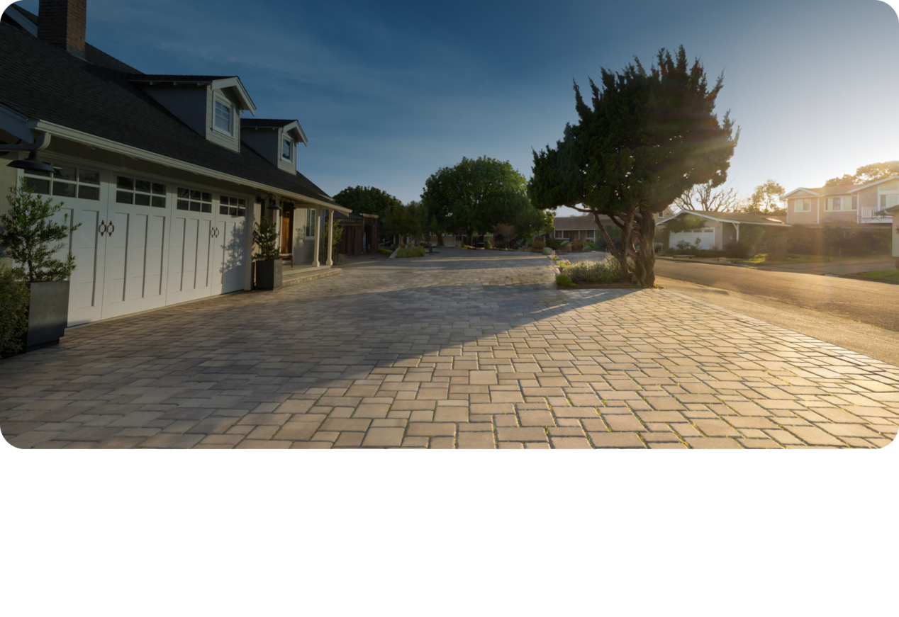 Brick Driveway Leading to a Garage