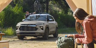 2026 Chevy Trailblazer Parked at a Campsite with a Bike Attached to the Roof Rack