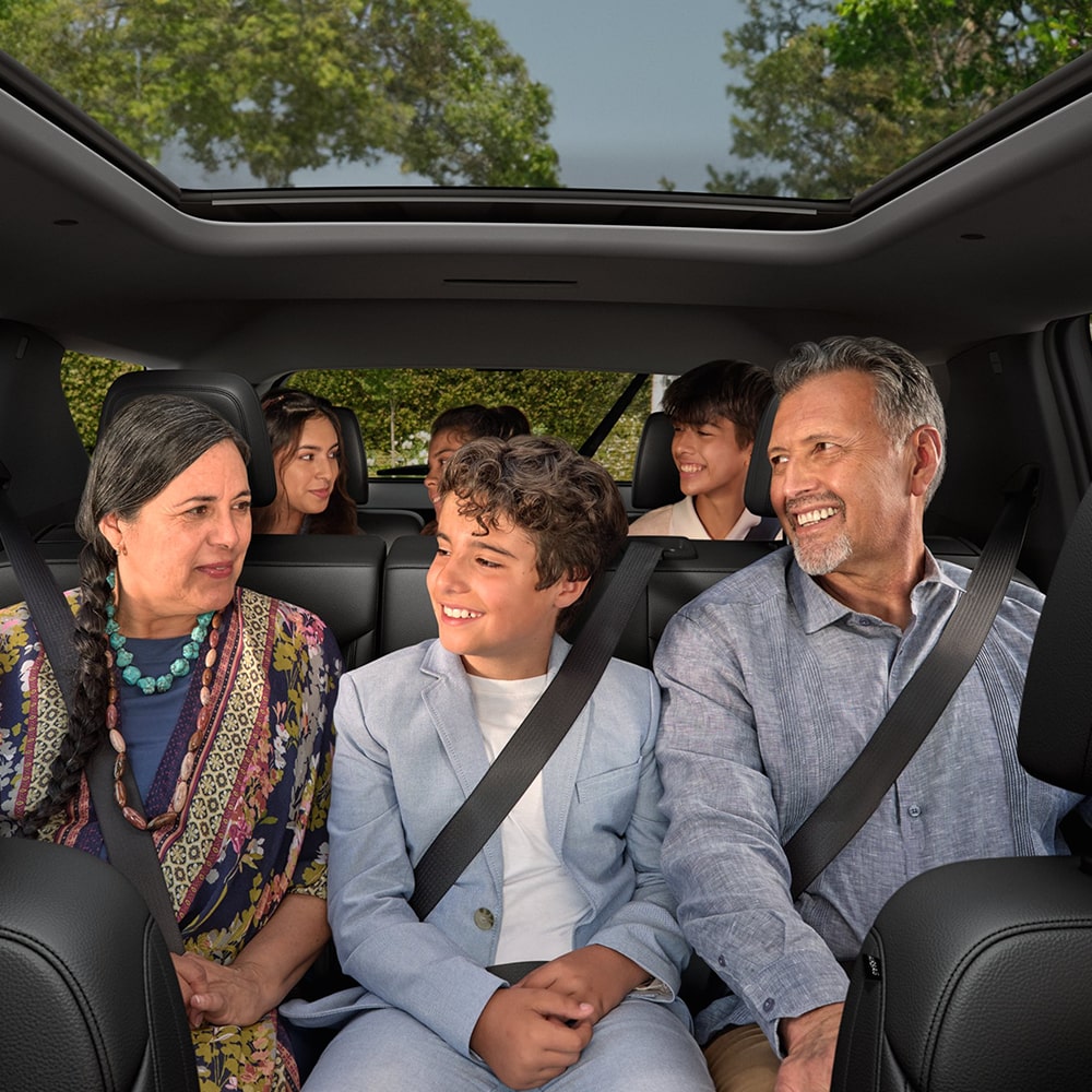 A Family Sitting in all 3 Rows of the Spacious 2026 Chevy Traverse