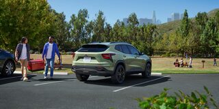 2026 Chevy Trax Parked near a Neighborhood Park on a Sunny Day