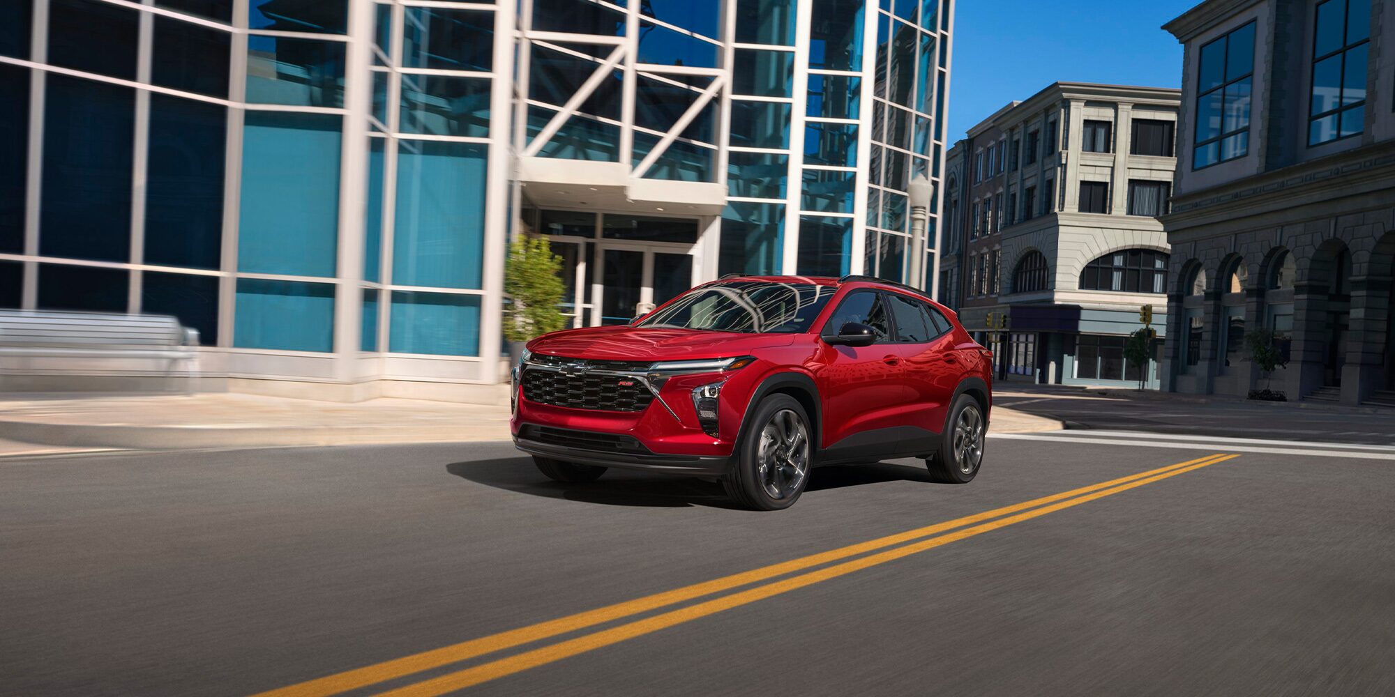2026 Chevy Trax Driving Through a Downtown Road