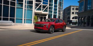 2026 Chevy Trax Driving Through a Downtown Road