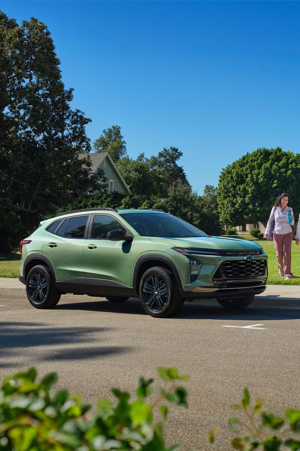 2026 Chevy Trax Parked near a Neighborhood Park on a Sunny Day