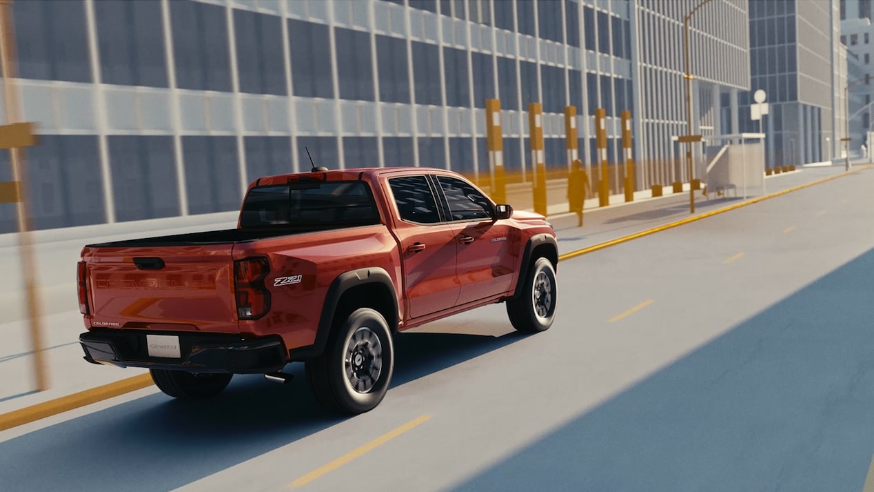 Video Thumbnail of a 3D Environment with an Aerial View of a Red 2026 Chevy Colorado Driving Down the Road