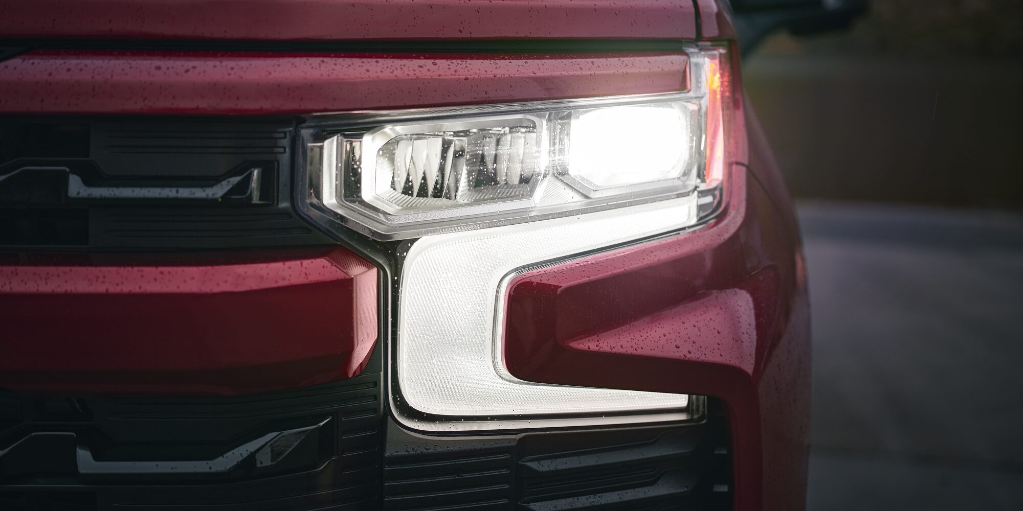 Close up view of the headlight of the 2026 Chevrolet Silverado LD.