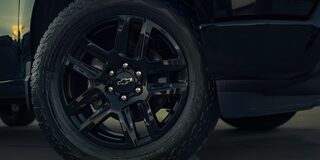 Close up view of the aluminum wheel of the 2026 Chevrolet Silverado LD.