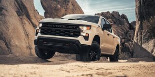 2026 Chevrolet Silverado LD Trail Boss driving through the canyons.