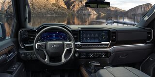 2026 Chevy Silverado Interior Dashboard with View of a Beautiful Lake Outside