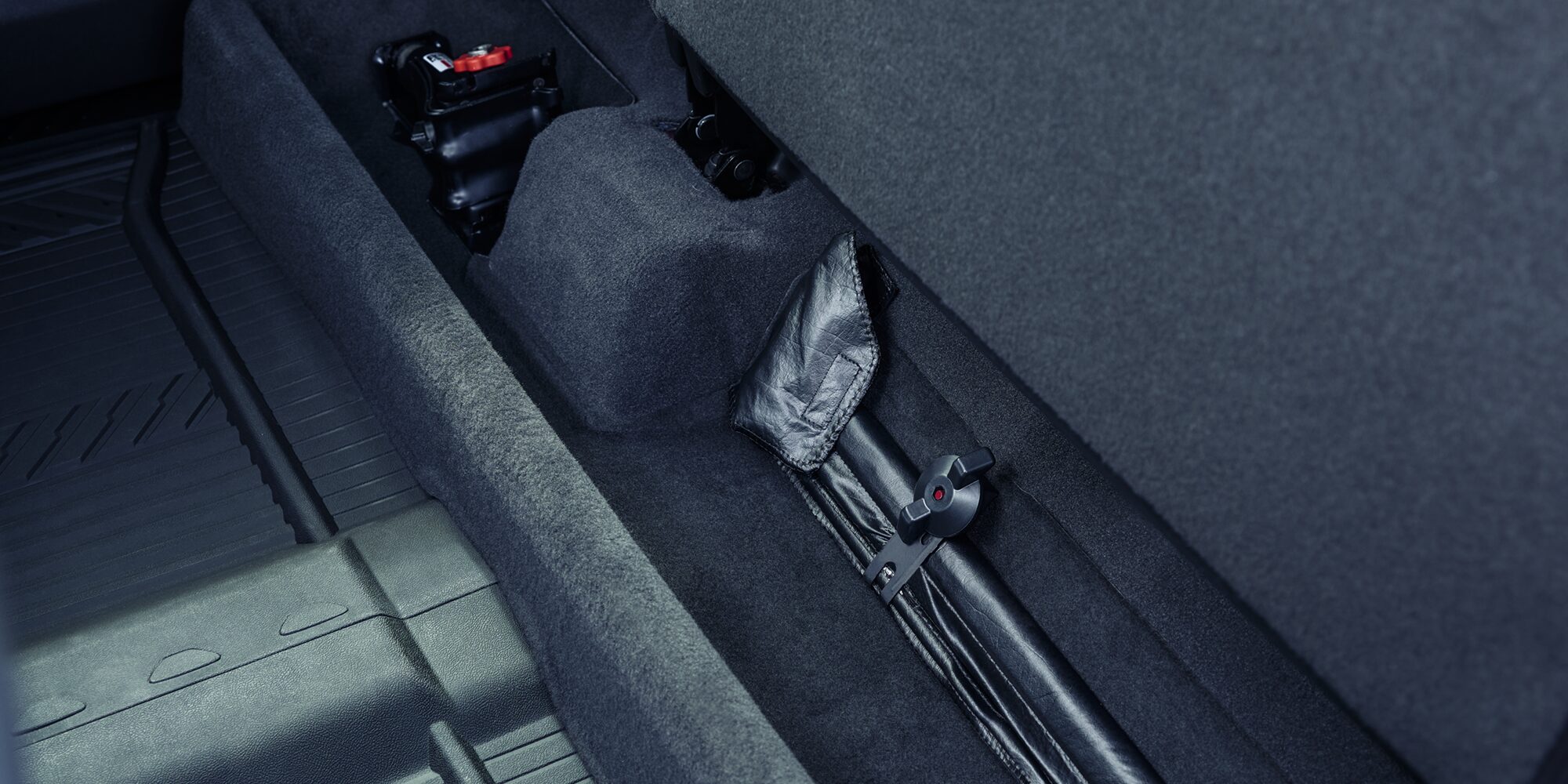 Close up view of the Under Seat Storage of the 2026 Chevrolet Silverado LD Crew Cab.