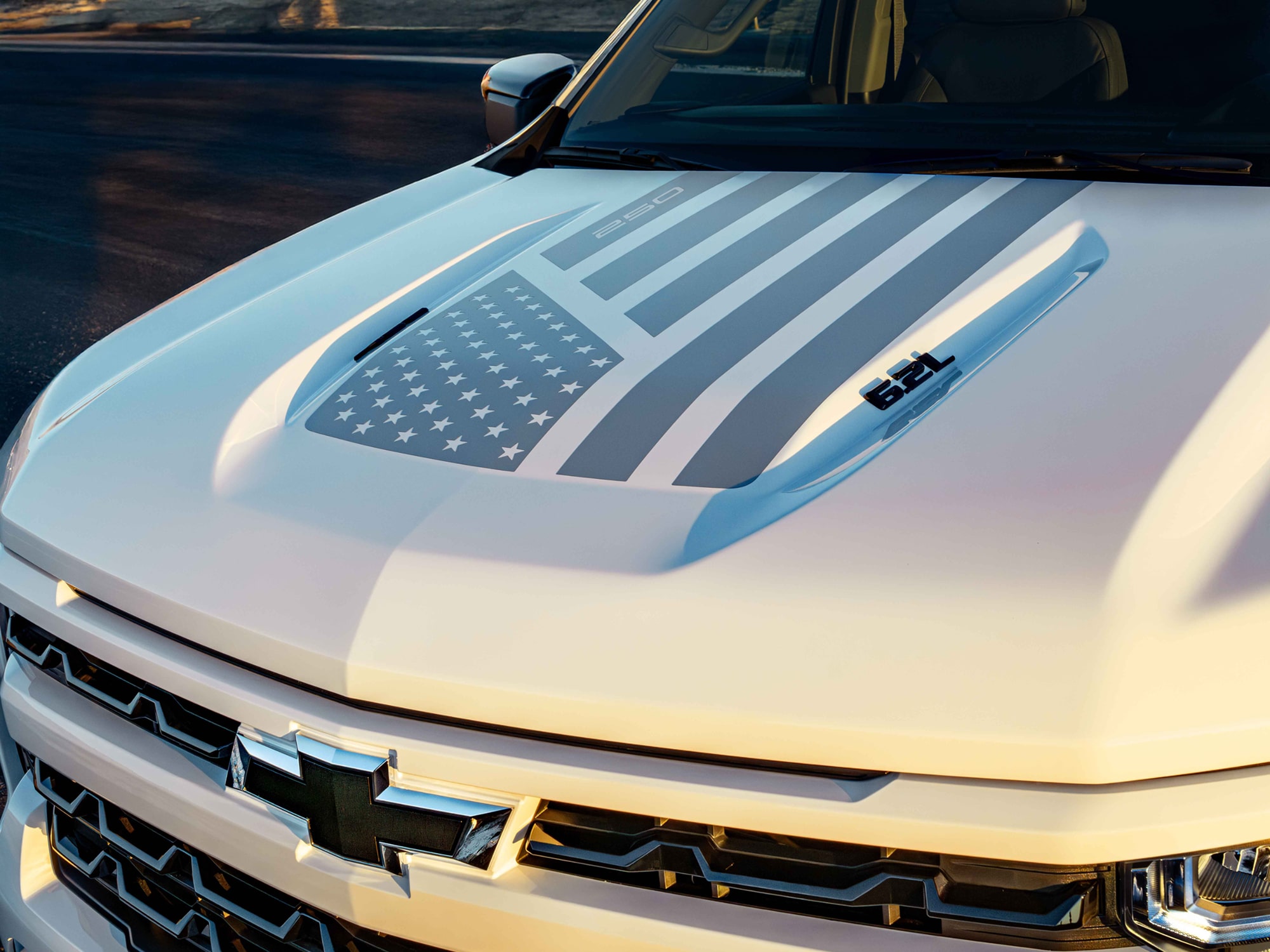 A Close-Up of the Chevrolet Silverado LD Hood, Displaying the Gray American Flag Decal of the Collection.
